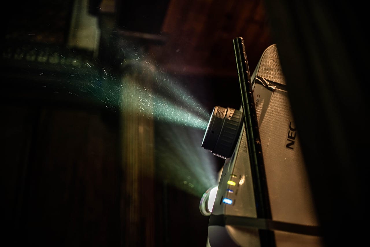 The beam from Walter's booth, the last night he ran a film print.